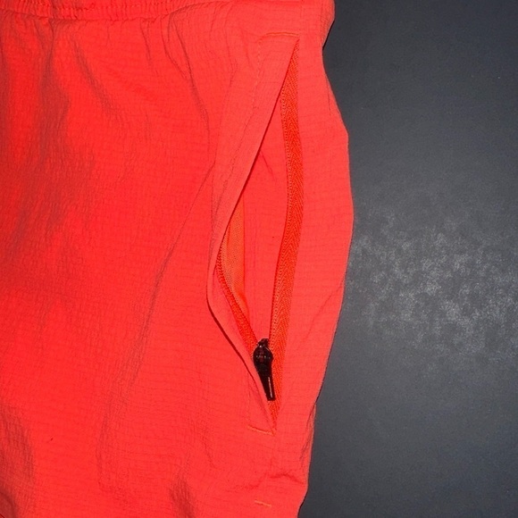 Athleta Trekkie Crest 2 in 1 Shortie in Racing Red Athletic Ripstop Neon Shorts - Picture 7 of 10